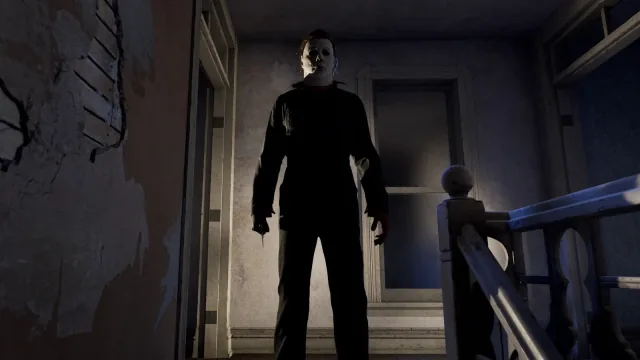 Michael Myers standing at the top of a staircase in official Halloween: The Game artwork