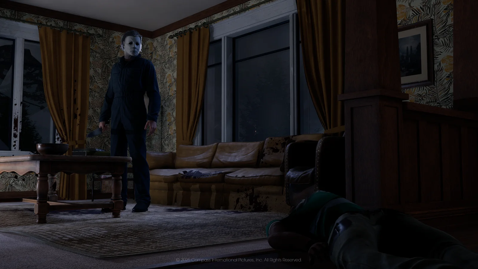 Michael Myers standing in a living room near a downed person